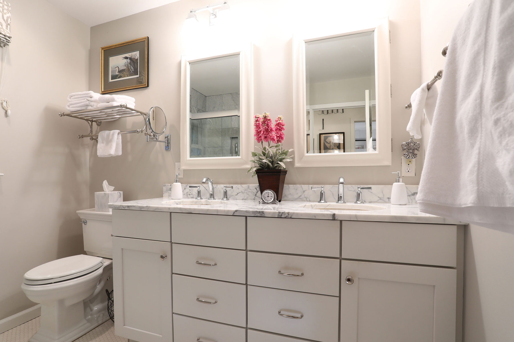 Double vanity with marble countertop
