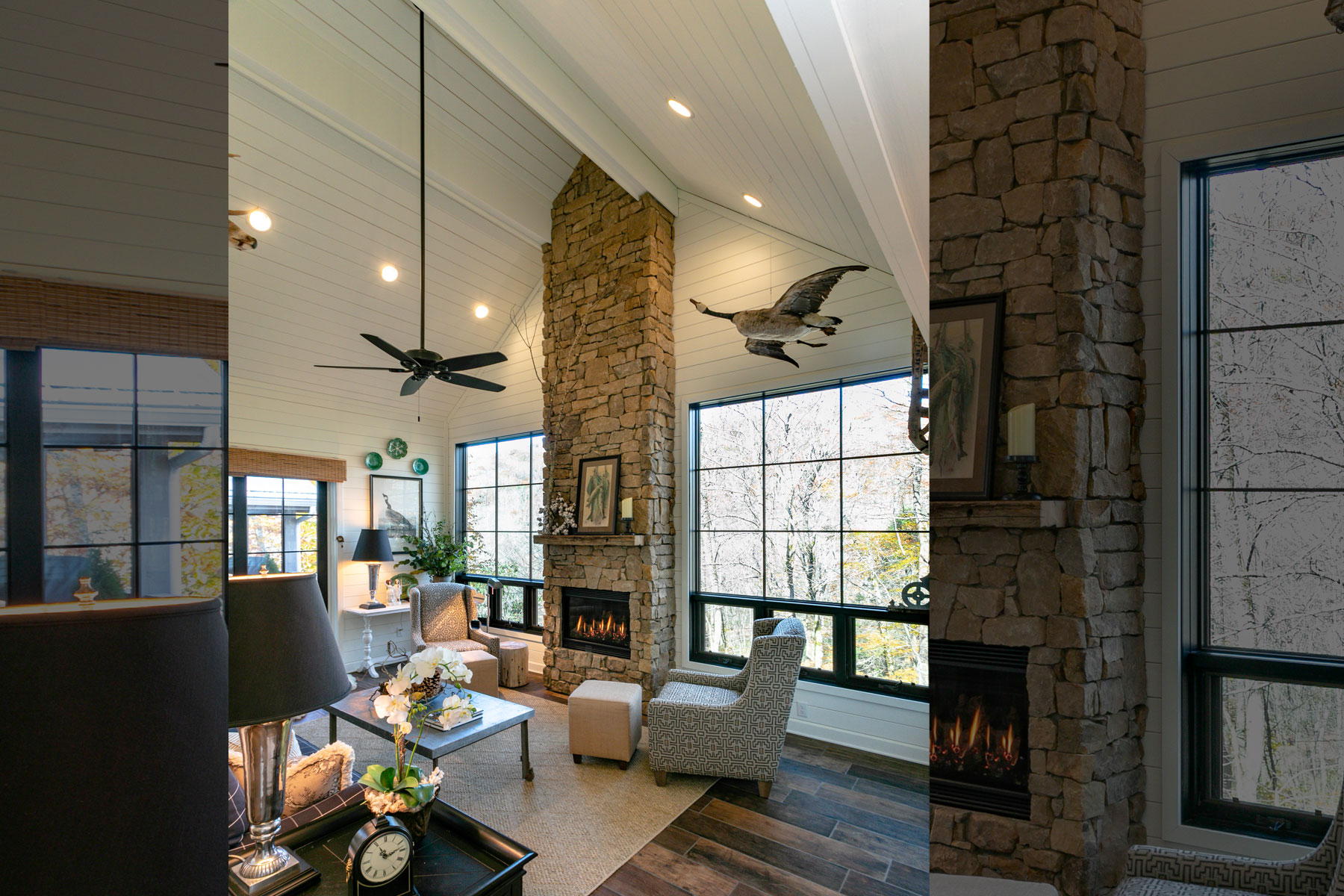 Stacked stone fireplace that reaches the ceiling in peaked room addition