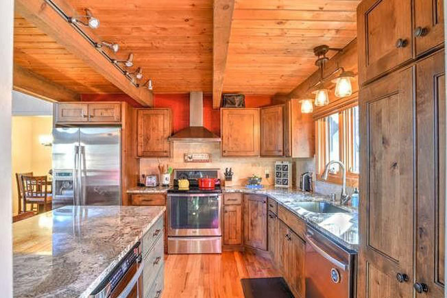 Knotty alder wood rustic kitchen cabinets