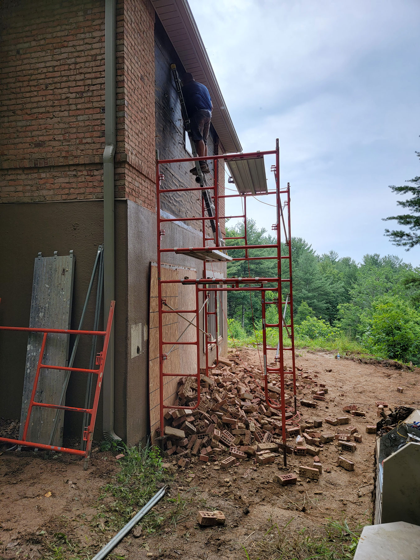Removing brick on an exterior wall to create a doorway