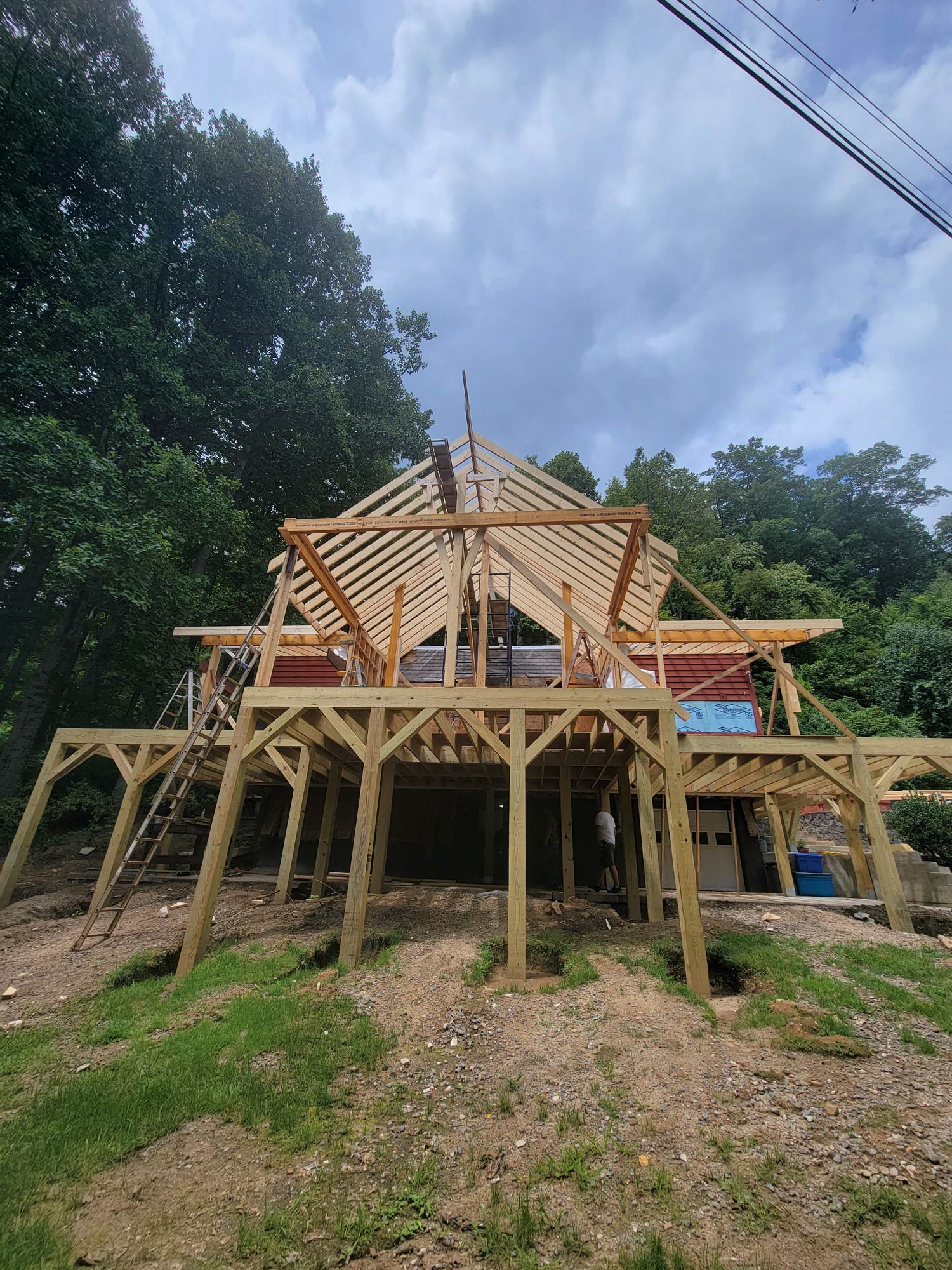 Framing is cool! See the shape of the newly redesigned home taking shape.