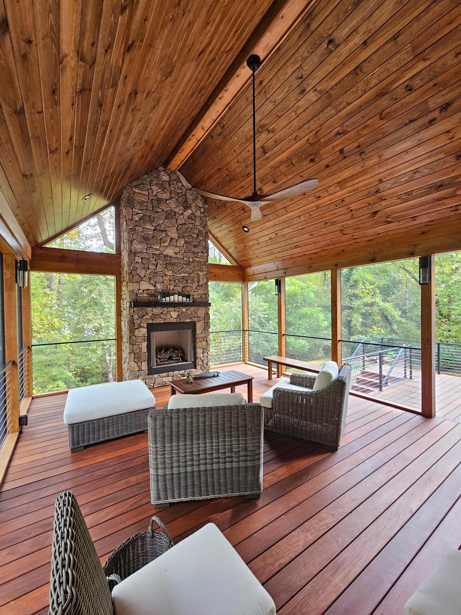 New covered deck with vaulted ceiling and fireplace. Screened
