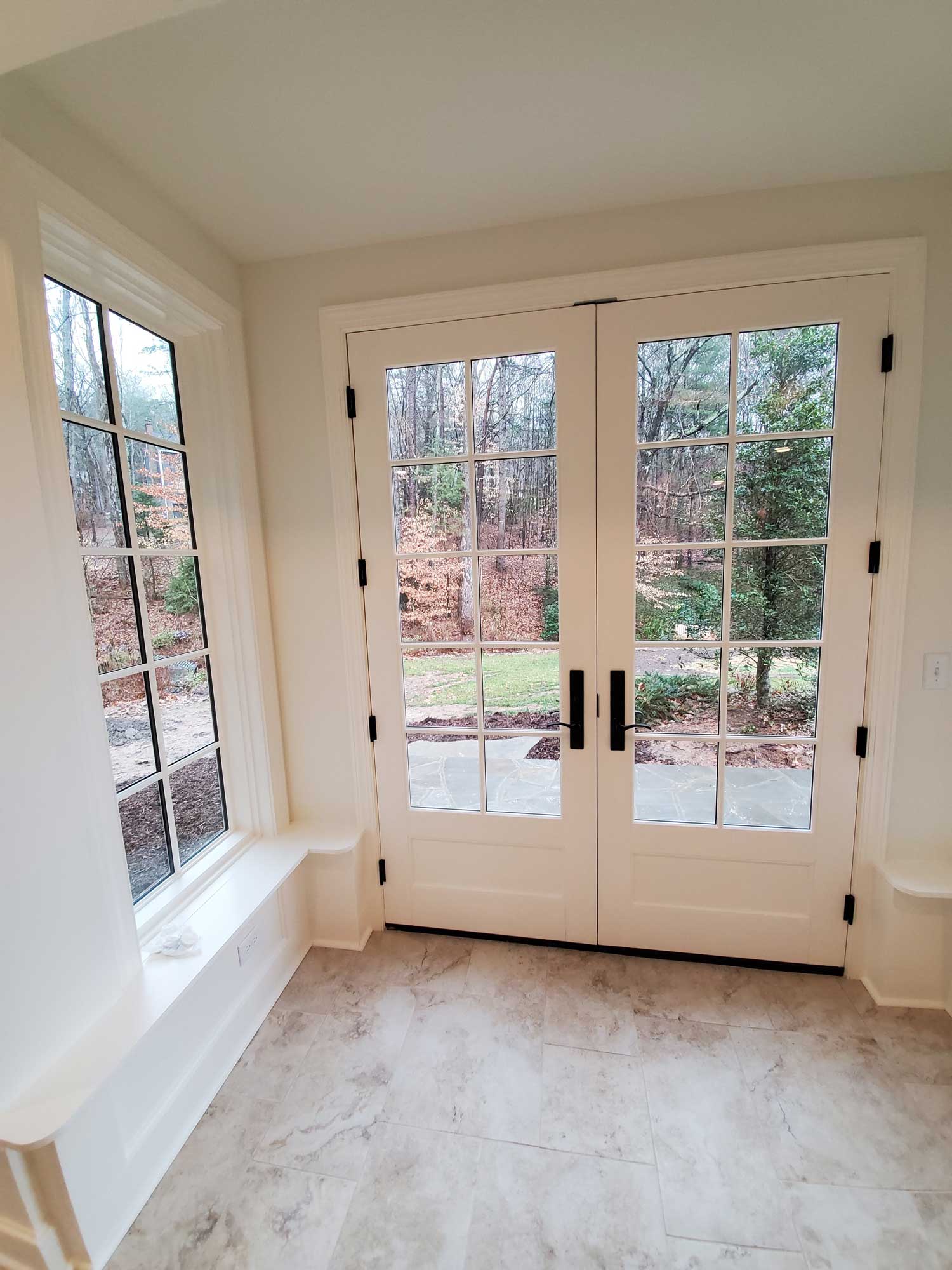 Main entry of french doors leading to back yard from new solarium addition in Sondley Estates Main entry of french doors leading to back yard from new solarium addition in Sondley Estates