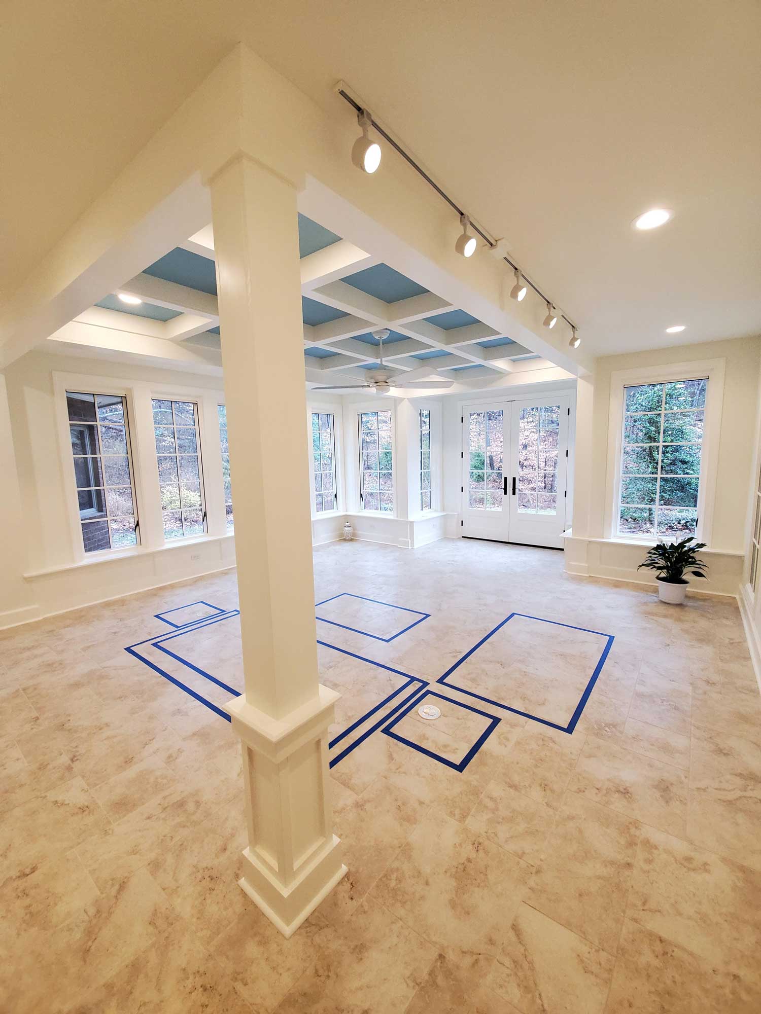Newly finished sunroom, conservatory, solarium addition in Sondley estates with coffered ceilings painted sky blue. Newly finished sunroom, conservatory, solarium addition in Sondley estates with coffered ceilings painted sky blue.